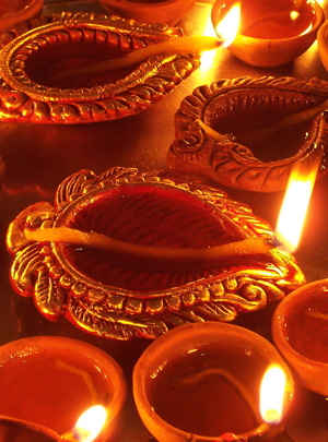 Diya, earthen lamps filled with oil, are lit for Diwali. Photo courtesy of Wikimedia Commons